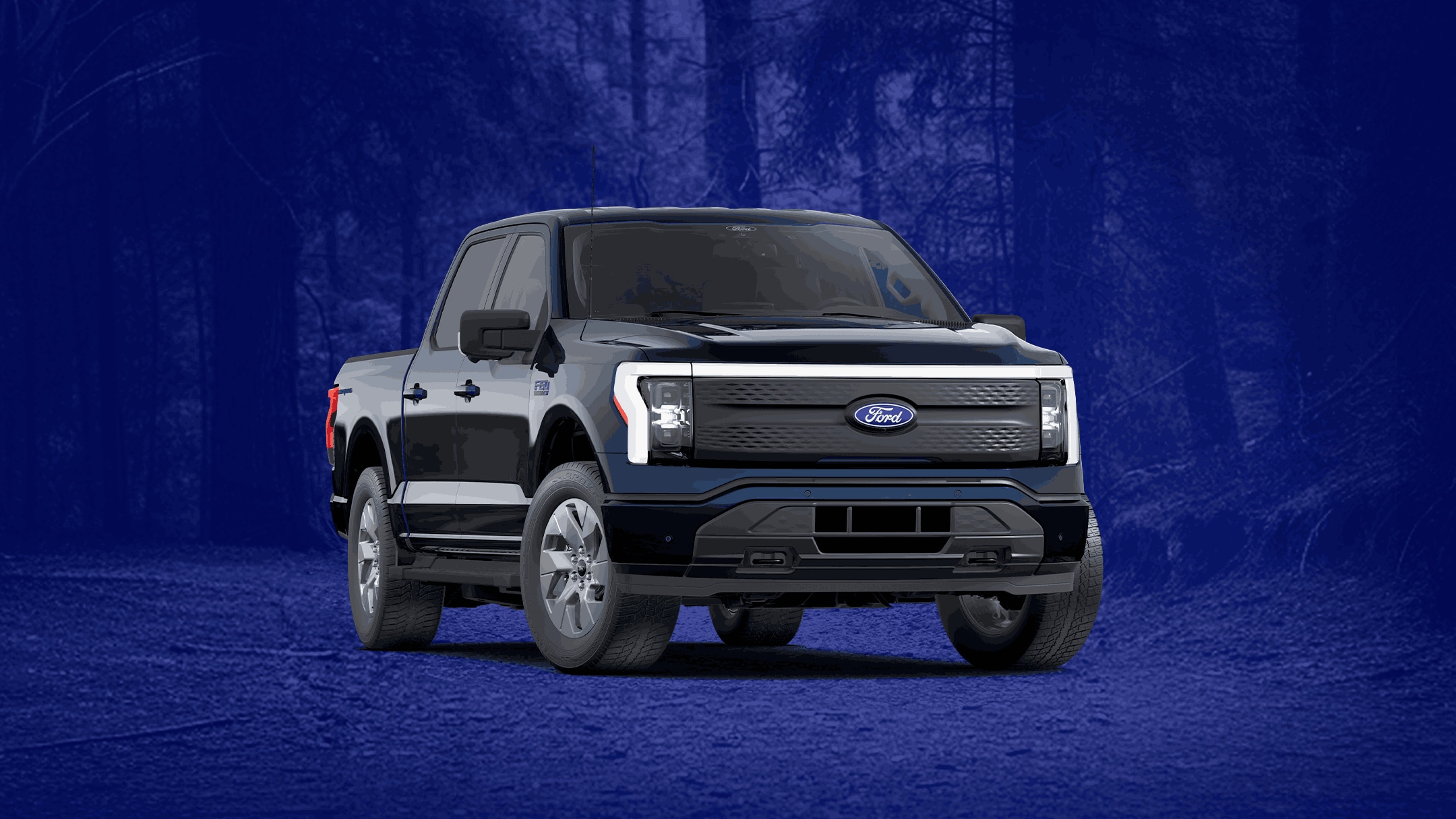 Ford F-150 Lightning so sottofondo blu con foresta